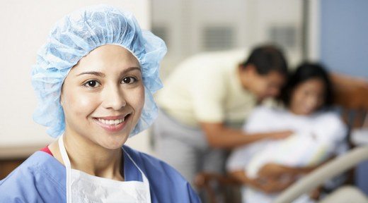 Smiling Physician near New Family