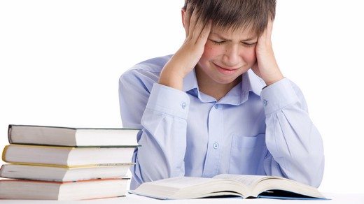 boy with books on white background
